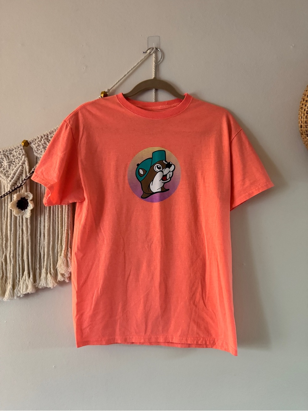 Playful Coral Graphic Tee with Dog Motif
